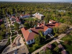 Aerial view of College Hall and Montclair State University campus buildings.